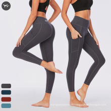 Pantalones de diseño de diseño de diseño de diseño de yoga de diseño simple Pantalones de yoga de mujeres secas rápidos con leggings de entrenamiento de bolsillo con bolsillo para mujeres